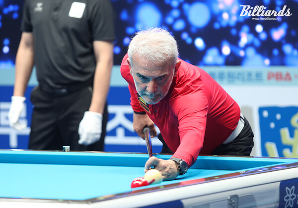 강적 이충복을 꺾고 64강에 진출한 아드난 윅셀(튀르키예).  사진=김도하 기자