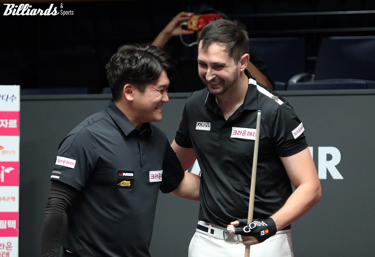 치열한 승부를 웃으면서 마무리하는 오태준과 마르티네스.  사진=고양/김민영 기자