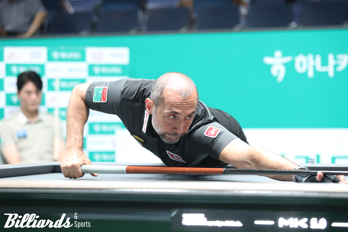 신주현과 128강 경기 중인 세미 사이그너. 사이그너는 3-1로 승리하고 64강에 올랐다.